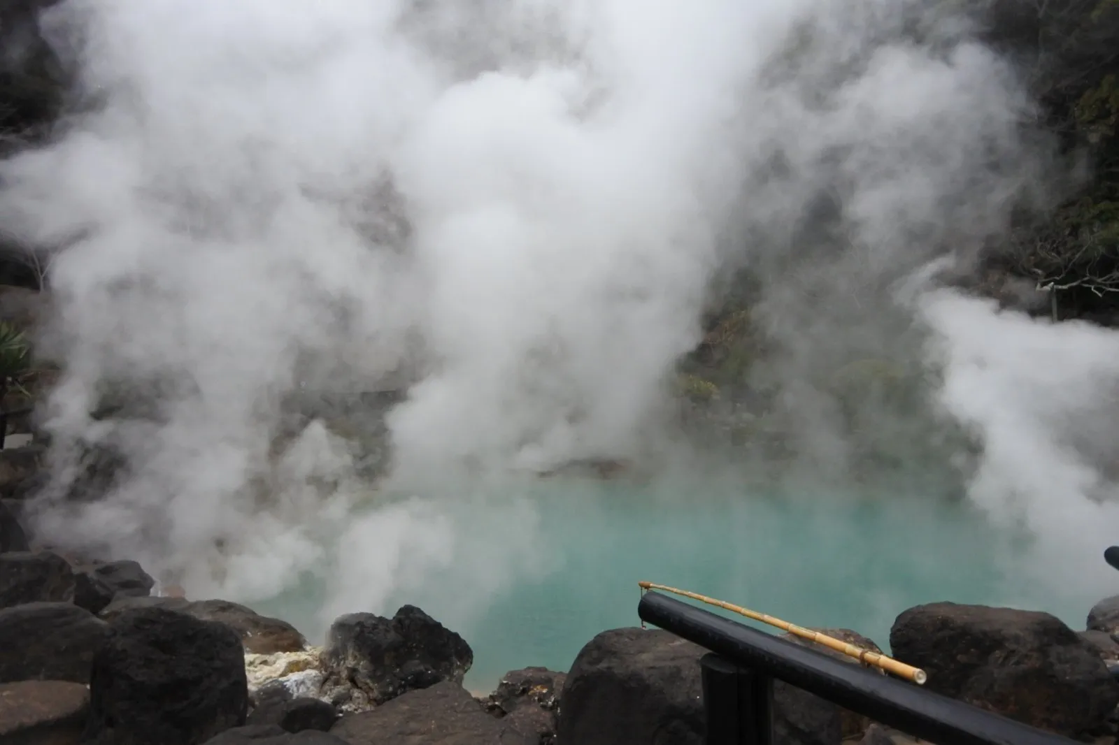 Umi Jigoku, a pale turquoise pond throwing off huge amounts of white steam